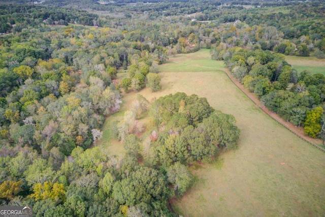 birds eye view of property featuring a rural view