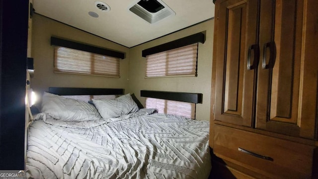 bedroom featuring lofted ceiling