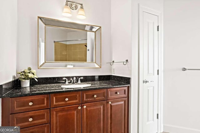 bathroom with vanity and walk in shower