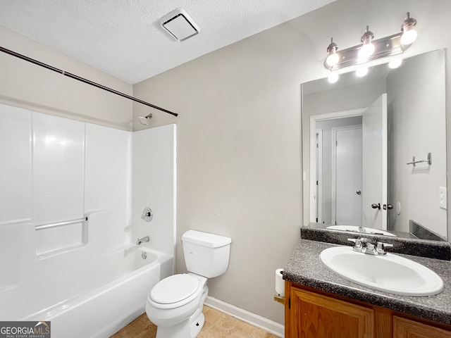 full bathroom featuring a textured ceiling, toilet, vanity, tile patterned flooring, and shower / bathtub combination