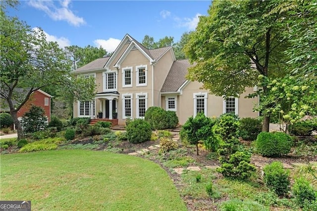 view of front of home featuring a front yard