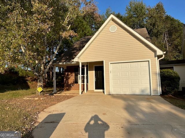 view of front of house with driveway and an attached garage