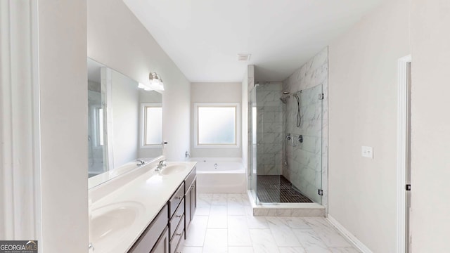 bathroom with vanity and separate shower and tub