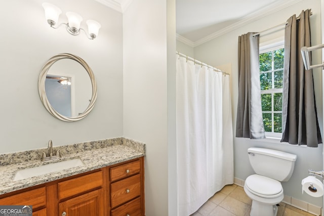 bathroom with vanity, ornamental molding, toilet, and tile patterned flooring