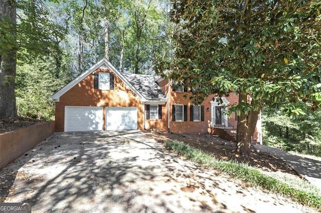 view of front of home with a garage