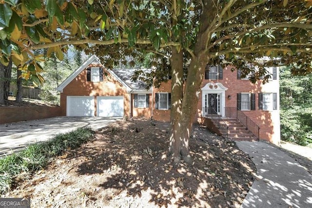 view of front of property featuring a garage