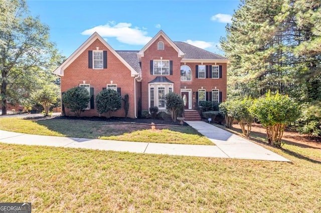 view of front of home featuring a front lawn