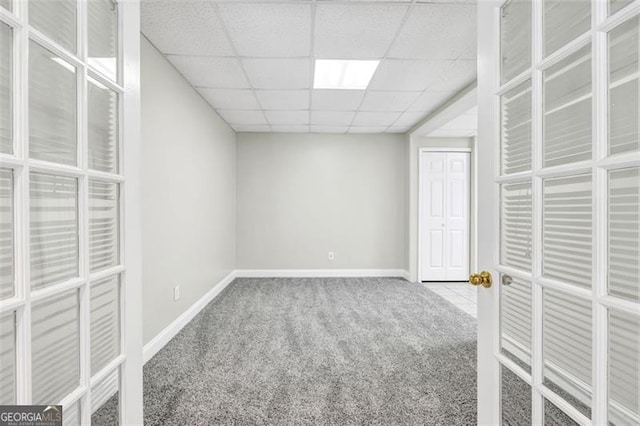 interior space featuring a paneled ceiling