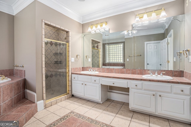 bathroom featuring vanity, independent shower and bath, and ornamental molding