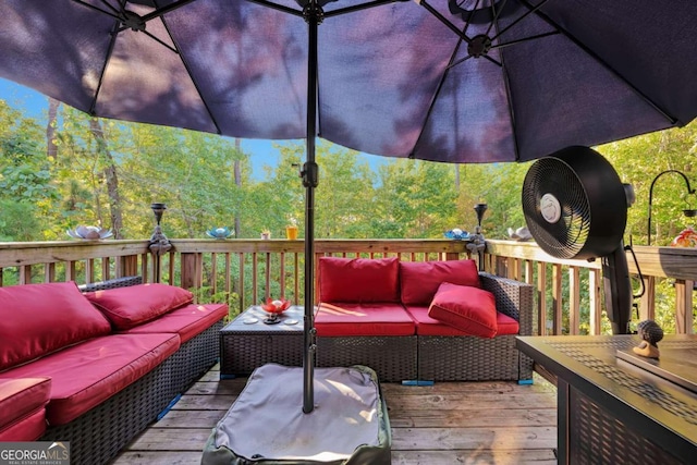 wooden deck featuring outdoor lounge area