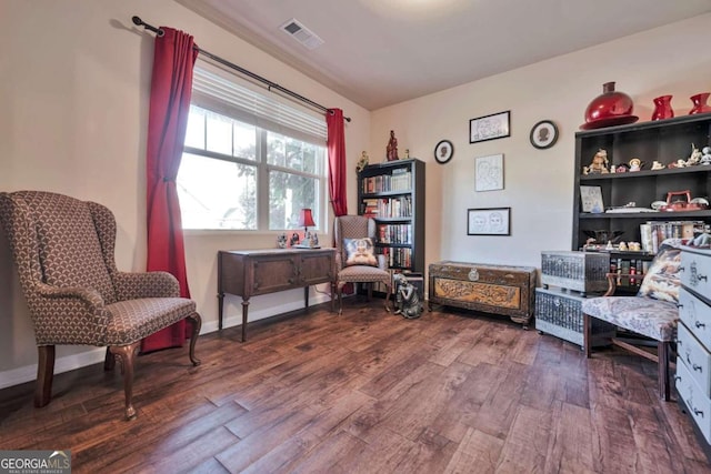 living area featuring hardwood / wood-style floors