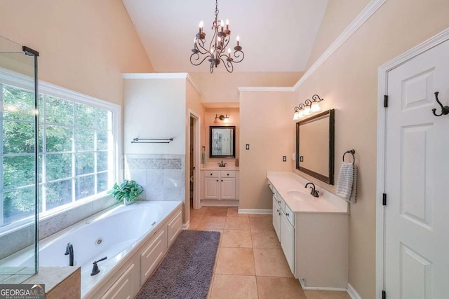 bathroom with lofted ceiling, a tub, vanity, a notable chandelier, and tile patterned floors