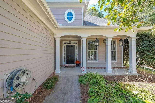 doorway to property with a porch