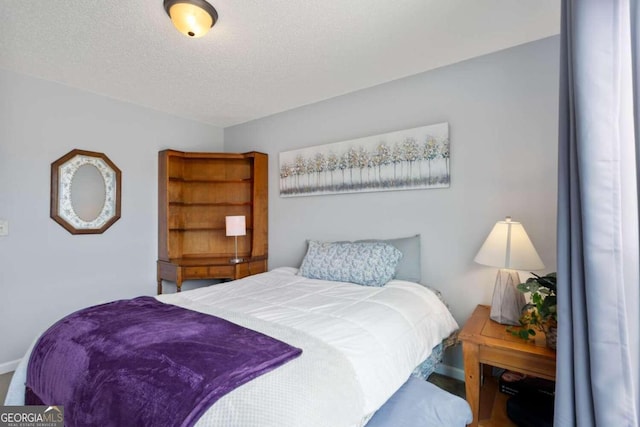 bedroom with a textured ceiling