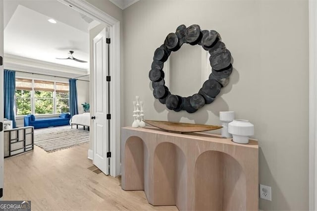 corridor featuring light hardwood / wood-style floors