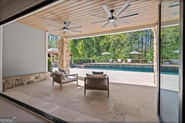 view of patio / terrace with ceiling fan