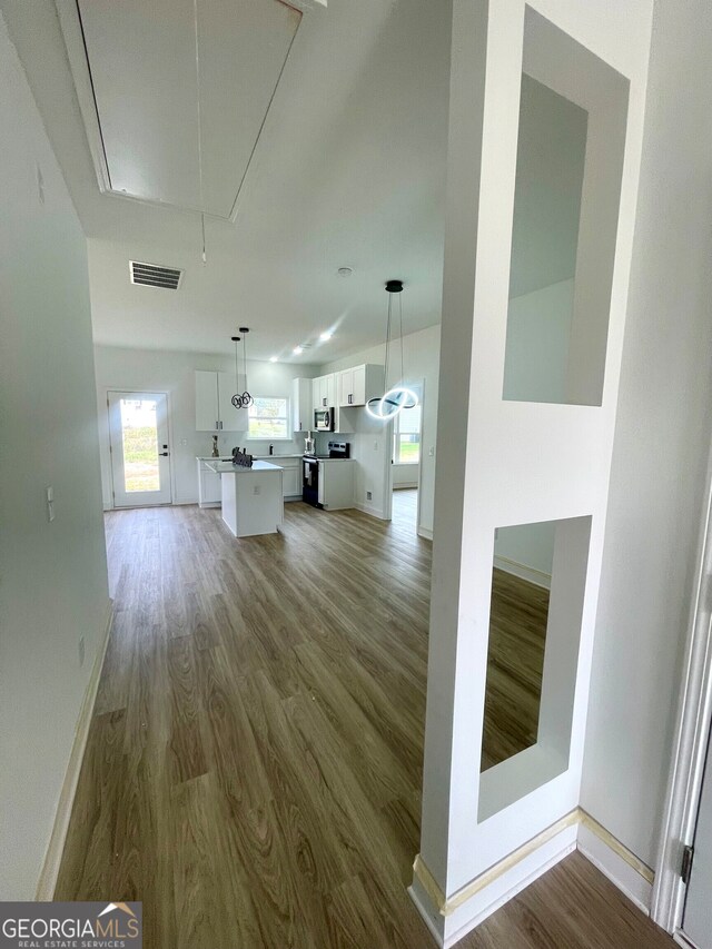 interior space with hardwood / wood-style floors