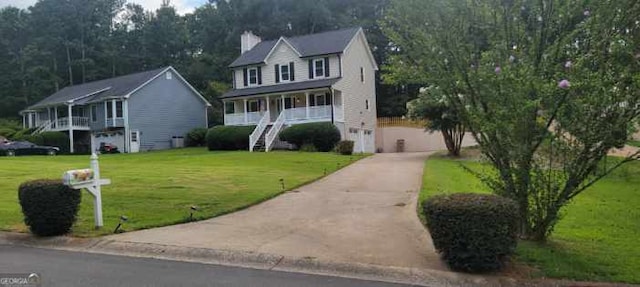 view of front of house with a front yard and covered porch