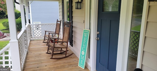 wooden deck with a porch