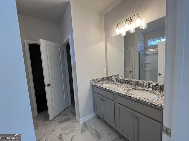 bathroom with an enclosed shower and vanity