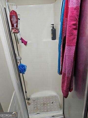 bathroom with walk in shower