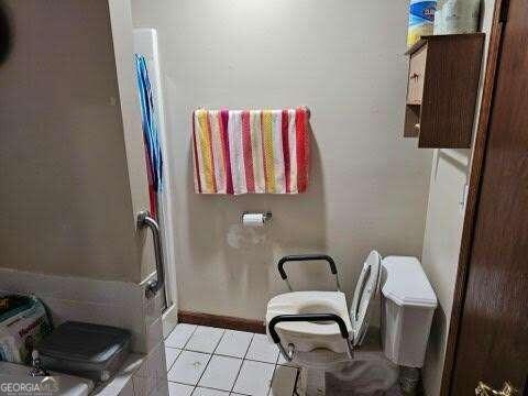 bathroom featuring tile patterned floors