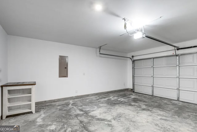 garage featuring a garage door opener and electric panel