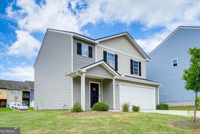 view of front of property with a front yard and a garage