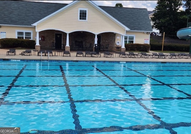 view of swimming pool featuring a patio