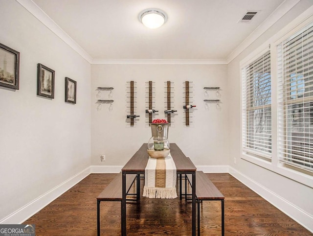 hall with crown molding and dark hardwood / wood-style floors