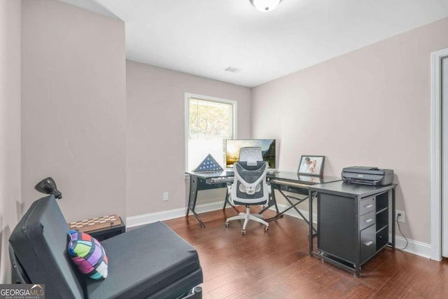 home office featuring dark hardwood / wood-style flooring