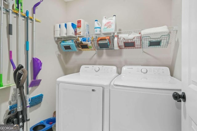 laundry room featuring separate washer and dryer