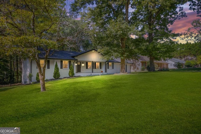 view of front of house with a lawn