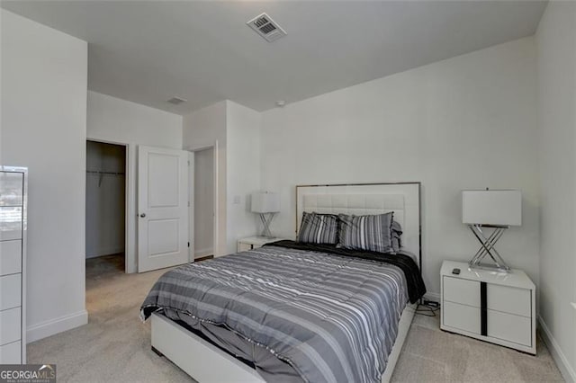 carpeted bedroom featuring a closet