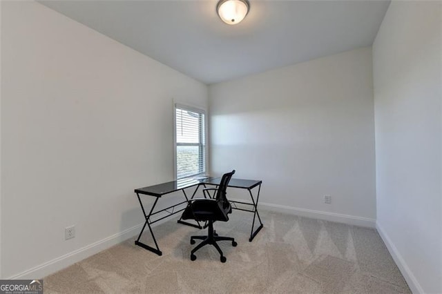 home office with light colored carpet