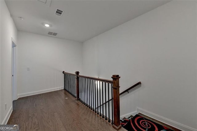 stairway with wood-type flooring