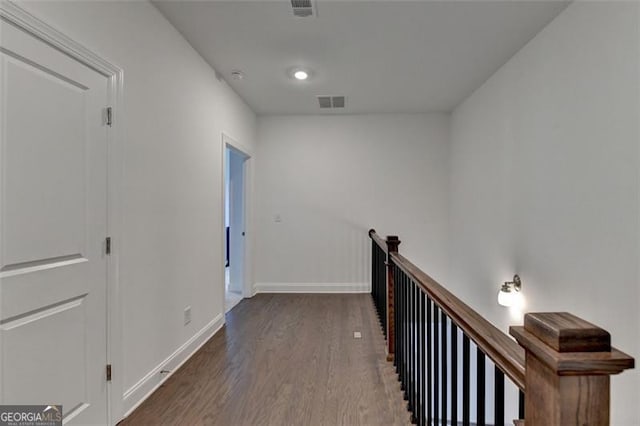 hall featuring dark wood-type flooring