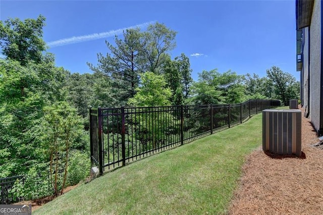 view of yard featuring central AC