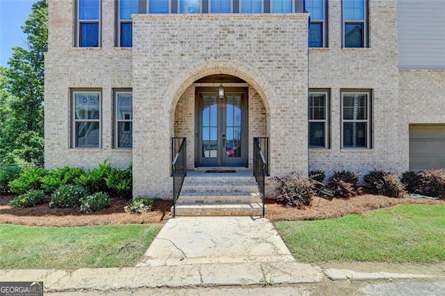 doorway to property with french doors