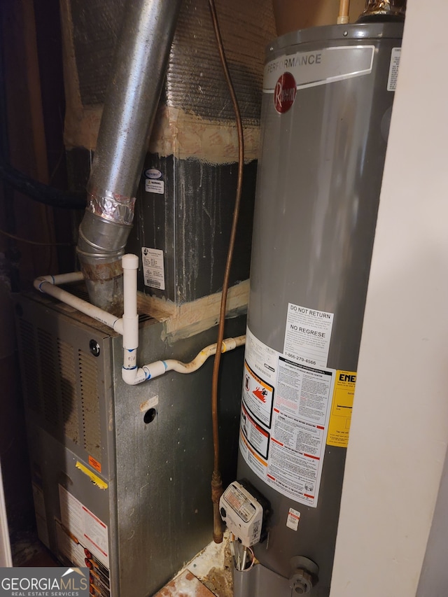 utility room with gas water heater