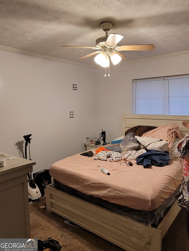 bedroom featuring crown molding, a textured ceiling, carpet flooring, and ceiling fan