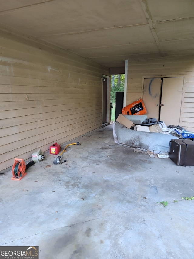 garage with wooden walls