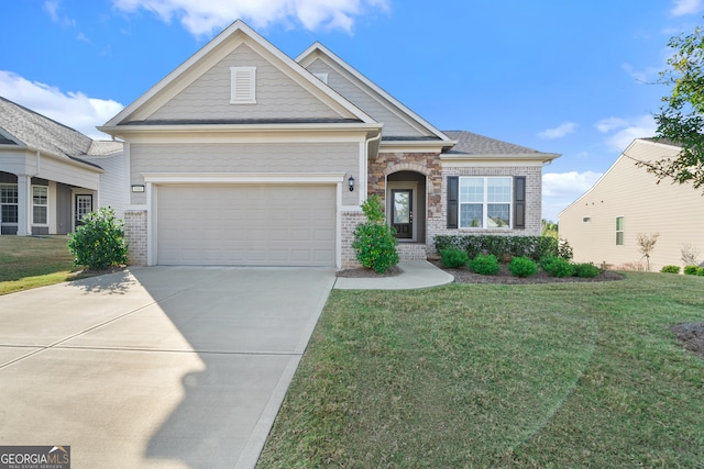 craftsman-style house featuring a front yard and a garage