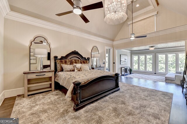 bedroom featuring ornamental molding, hardwood / wood-style flooring, high vaulted ceiling, and ceiling fan