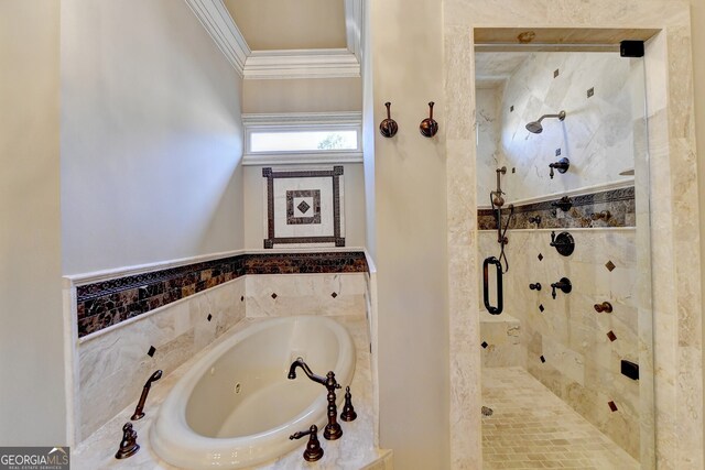 bathroom with ornamental molding and plus walk in shower