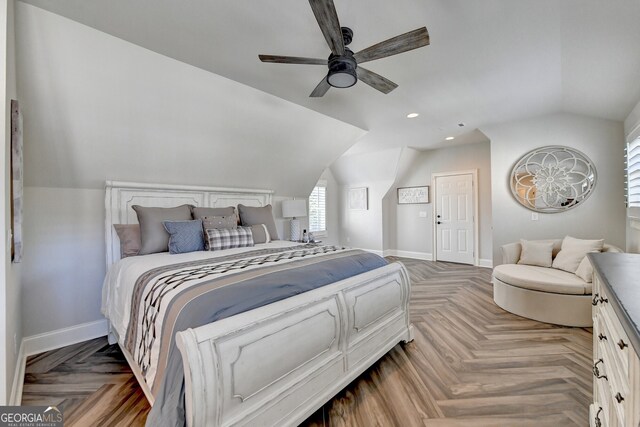 bedroom with parquet flooring, lofted ceiling, and ceiling fan