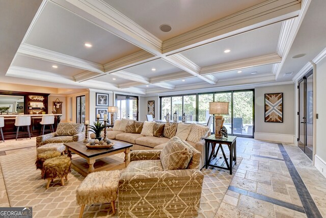 living room featuring ornamental molding, beam ceiling, and coffered ceiling