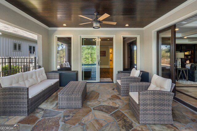 view of patio featuring ceiling fan and outdoor lounge area