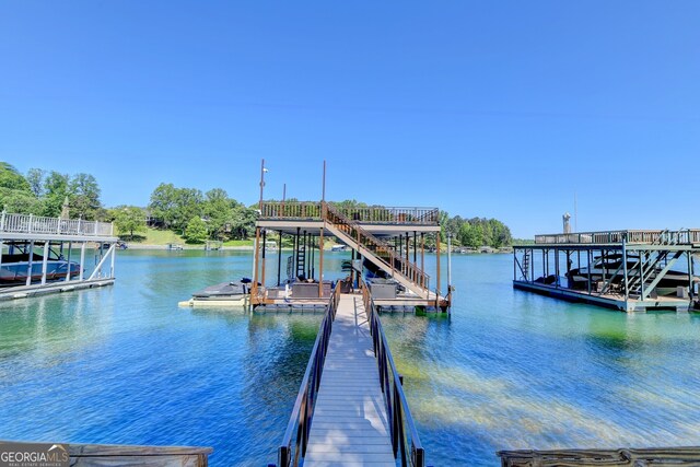 dock area with a water view