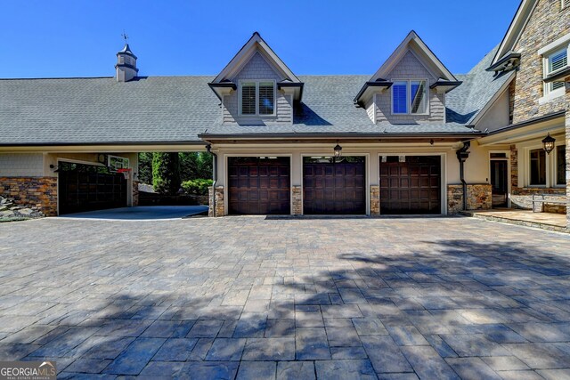 view of front of house featuring a carport